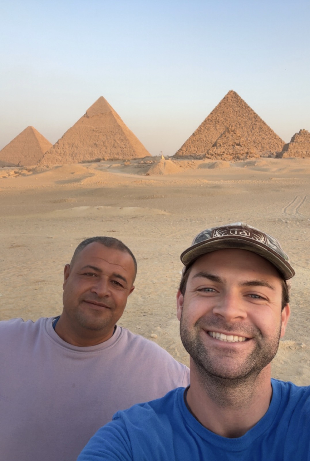 Selfie with a guide in front of the pyramids at Giza